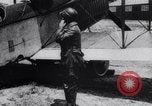 Image of Liberty L-12 airplane engine and fliers of the 94th Aero Squadron United States USA, 1918, second 58 stock footage video 65675033856