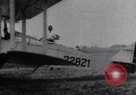 Image of Liberty L-12 airplane engine and fliers of the 94th Aero Squadron United States USA, 1918, second 62 stock footage video 65675033856