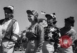 Image of girl jockeys Mexico, 1939, second 8 stock footage video 65675033936