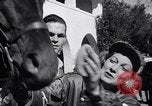 Image of girl jockeys Mexico, 1939, second 14 stock footage video 65675033936