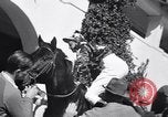 Image of girl jockeys Mexico, 1939, second 18 stock footage video 65675033936