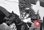 Image of girl jockeys Mexico, 1939, second 19 stock footage video 65675033936