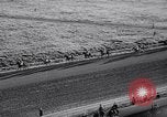 Image of girl jockeys Mexico, 1939, second 24 stock footage video 65675033936