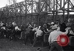Image of girl jockeys Mexico, 1939, second 30 stock footage video 65675033936