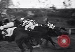 Image of girl jockeys Mexico, 1939, second 32 stock footage video 65675033936