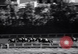 Image of girl jockeys Mexico, 1939, second 41 stock footage video 65675033936