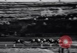 Image of girl jockeys Mexico, 1939, second 44 stock footage video 65675033936