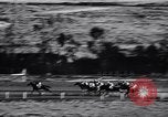 Image of girl jockeys Mexico, 1939, second 47 stock footage video 65675033936