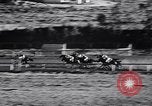 Image of girl jockeys Mexico, 1939, second 48 stock footage video 65675033936