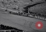 Image of girl jockeys Mexico, 1939, second 59 stock footage video 65675033936