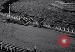 Image of girl jockeys Mexico, 1939, second 61 stock footage video 65675033936