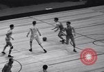 Image of college basketball game New York City USA, 1940, second 5 stock footage video 65675033945
