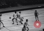 Image of college basketball game New York City USA, 1940, second 8 stock footage video 65675033945