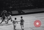 Image of college basketball game New York City USA, 1940, second 9 stock footage video 65675033945