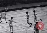 Image of college basketball game New York City USA, 1940, second 15 stock footage video 65675033945