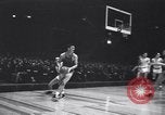 Image of college basketball game New York City USA, 1940, second 16 stock footage video 65675033945