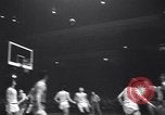 Image of college basketball game New York City USA, 1940, second 18 stock footage video 65675033945