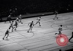 Image of college basketball game New York City USA, 1940, second 22 stock footage video 65675033945