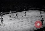 Image of college basketball game New York City USA, 1940, second 23 stock footage video 65675033945