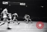 Image of college basketball game New York City USA, 1940, second 24 stock footage video 65675033945