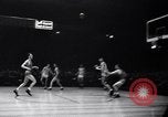 Image of college basketball game New York City USA, 1940, second 26 stock footage video 65675033945