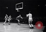 Image of college basketball game New York City USA, 1940, second 27 stock footage video 65675033945