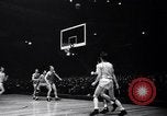 Image of college basketball game New York City USA, 1940, second 28 stock footage video 65675033945