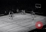 Image of college basketball game New York City USA, 1940, second 34 stock footage video 65675033945