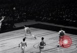 Image of college basketball game New York City USA, 1940, second 43 stock footage video 65675033945