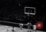 Image of college basketball game New York City USA, 1940, second 44 stock footage video 65675033945