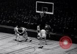 Image of college basketball game New York City USA, 1940, second 46 stock footage video 65675033945