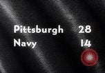 Immagine di Partita di calcio Pittsburgh Pennsylvania USA, 1961, secondo 5 filmato di repertorio 65675034000