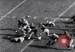 Immagine di Partita di calcio Pittsburgh Pennsylvania USA, 1961, secondo 40 filmato di repertorio 65675034000