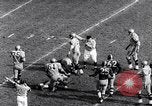 Immagine di Partita di calcio Pittsburgh Pennsylvania USA, 1961, secondo 45 filmato di repertorio 65675034000