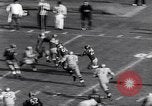 Immagine di Partita di calcio Pittsburgh Pennsylvania USA, 1961, secondo 50 filmato di repertorio 65675034000