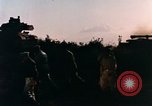 Image of NATO tanks moving backward on a hilltop Paris France, 1961, second 7 stock footage video 65675034033
