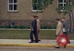 Standbild US-Präsident John F Kennedy auf Terrasse Service Club Kaserne Fliegerhorst Post Hanau Deutschland, 1963, aus Sekunde 11 historischem Filmmaterial Videoclip 65675034041