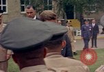 Standbild US-Präsident John F Kennedy auf Terrasse Service Club Kaserne Fliegerhorst Post Hanau Deutschland, 1963, aus Sekunde 19 historischem Filmmaterial Videoclip 65675034041