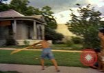 Image of Children at play United States USA, 1965, second 15 stock footage video 65675034055