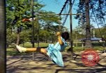 Image of Children at play United States USA, 1965, second 30 stock footage video 65675034055