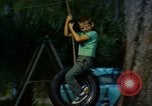 Image of Children at play United States USA, 1965, second 55 stock footage video 65675034055