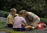 Image of Children at play United States USA, 1965, second 60 stock footage video 65675034055