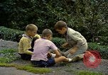 Image of Children at play United States USA, 1965, second 61 stock footage video 65675034055