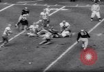 Image of American football match New York City USA, 1962, second 24 stock footage video 65675034216