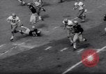 Image of American football match New York City USA, 1962, second 37 stock footage video 65675034216