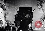Image of Castro Revolutionaries attack Moncada army barracks  Cuba, 1953, second 23 stock footage video 65675034273