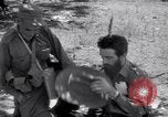 Image of guerrillas Cuba, 1959, second 34 stock footage video 65675034307
