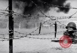 Standbild Schlachtfeld Vietnam, 1964, aus Sekunde 10 historischem Filmmaterial Videoclip 65675034313