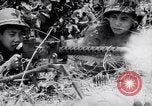Standbild Schlachtfeld Vietnam, 1964, aus Sekunde 32 historischem Filmmaterial Videoclip 65675034313