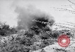 Standbild Schlachtfeld Vietnam, 1964, aus Sekunde 36 historischem Filmmaterial Videoclip 65675034313